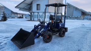 Elektro Hoflader Radlader mit Schaufel-Palettengabel-Ladegerät Bild 4