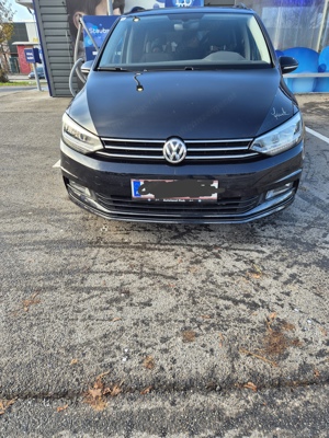 VW Touran 7-Sitzer inkl. integriertem Kindersitz und Dachbox 