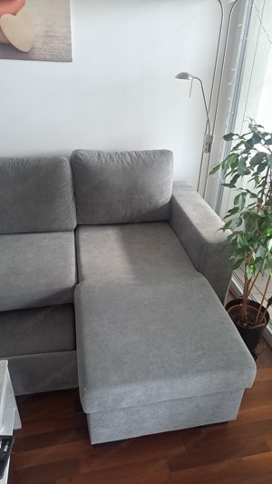 fast neue Couch mit Bettfunktion und Stauraum