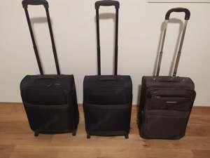 2 schwarze Koffer Trolley