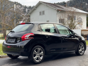 Peugeot 208 1,4 VTi TÜV neu Bild 4