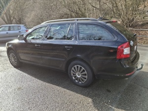 Octavia, Bj 2012, 230tkm, 1,6 TDI 4X4, SCHWARZ, Pickerl9 25, 8-Fach Bereift Bild 3