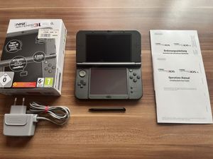 Nintendo 3DS mit Zubehör und drei Spielen