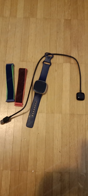 Fitbit Frauen Uhr, 2 Powerbanks