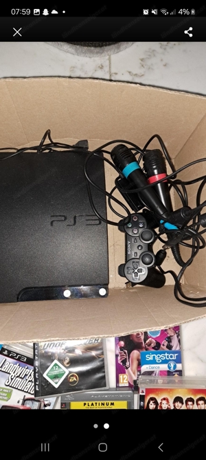 Playstation 3 mit 2 Mikrofonen und 6 Spielen 