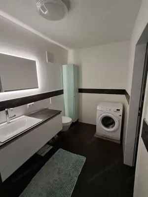 Modernes Wohnen in exklusiver Lage inkl. Tiefgaragenparkplatz und hochwertiger Markenküche Bild 7