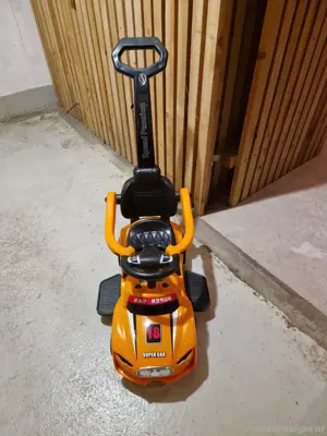 Rutschauto mit Schiebstange Bild 2