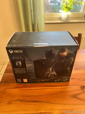 Xbox serie x infinite spielkonsole mit 2 controller und verpakung  Bild 3