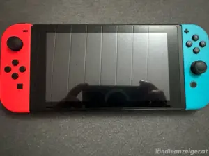 Nintendo switch spielkonsole mit 3 controller  Bild 2