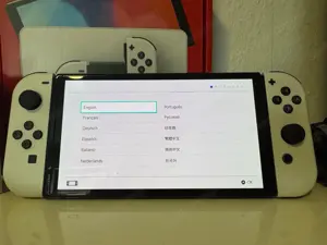 Nintendo Switch OLED-Modell HEG-001 64GB Handheld-Spielekonsole - Weiß Bild 2