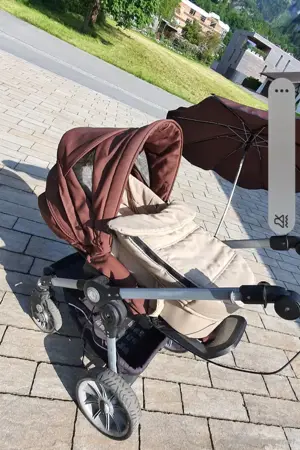Teutonia Kinderwagen mit Schale Bremse und Sonnenschirm