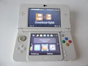 Nintendo 3DS mit TV-Spielekonsole, Ladegerät, Tasche für Spieleladegerät, Videospiele und box Bild 2