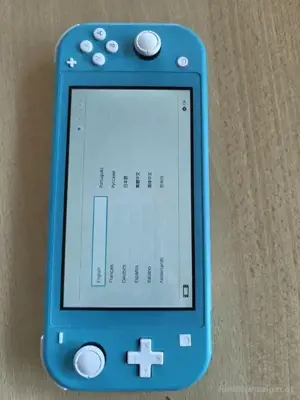 Nintendo lite spielkonsole mit verpakung und rechung  Bild 2