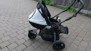Gebraucht gekauften Kinderwagen  Paggy abzugeben
