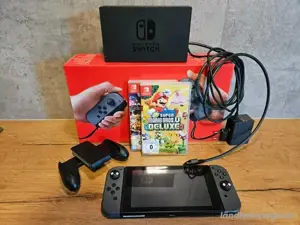Nintendo spielkonsole mit Mario kart und super Mario Bros U Deluxe 