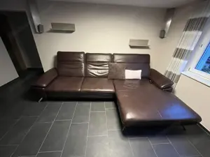 Ecksofa mit motorischer Ottomane - Echtleder Bild 3