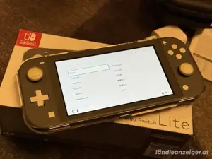Nintendo Switch lite spielkonsole mit 3 videospiel im originalverpackung Bild 2