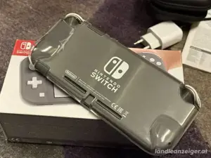Nintendo Switch lite spielkonsole mit 3 videospiel im originalverpackung Bild 3