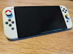 Nintendo Switch Oled model mit panzer - Scheiber in Weiß  mit 5 spiele+ Extra 64GB SDCard  Bild 3