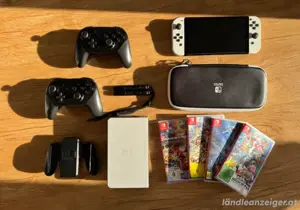 Nintendo Switch OLED   Komplettpaket mit 2 Pro Controllern+4 Spielen