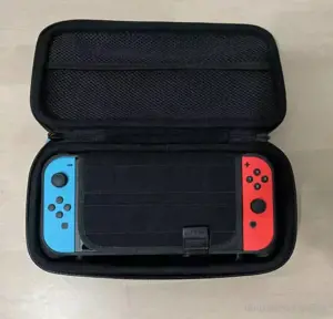Nintendo Switch Bundle: 7 Spiele (davon 4 neue ungeöffnete), Pro Controller und Hülle Bild 2