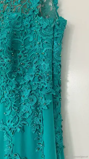 Ungetragenes Abendkleid zu verkaufen Größe 44 Bild 4