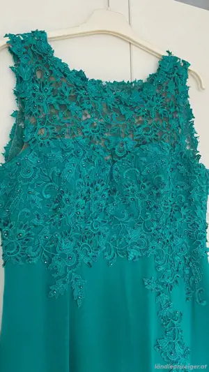 Ungetragenes Abendkleid zu verkaufen Größe 44 Bild 2