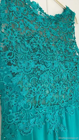 Ungetragenes Abendkleid zu verkaufen Größe 44 Bild 3