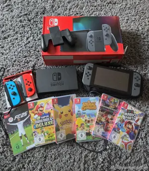Nintendo switch Spielkonsole ,  controller , joycon und 6 videospiel im OVP .