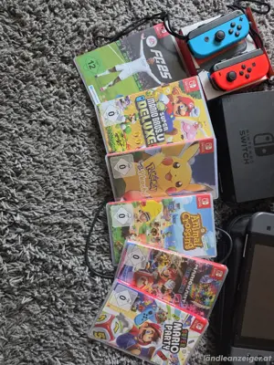 Nintendo switch Spielkonsole ,  controller , joycon und 6 videospiel im OVP . Bild 3