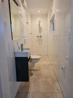 Vielfältig nutzbares Geschäftslokal mit kleiner Wohnung zu vermieten Bild 6
