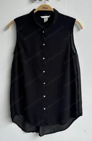 Schwarze, transparente ärmellose Bluse von H u M