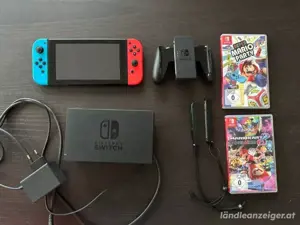 Nintendo switch spielkonsole mit OVP + Mario kart und super Mario party  , zustand : neue  Bild 3