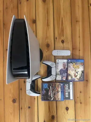 Sony PS5 spielkonsole neu zustand mit 3 videospiel + 2 controller und OVP