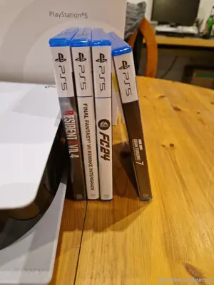 PS5  sony spielkonsole pit kontrollern und 4 disc videospiel , OVP  + rechung . Bild 4
