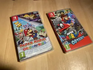 Nintendo Switch OLED Schwarz Weiß (sehr gut) - Viel Zubehör & 2 Spiele Bild 4