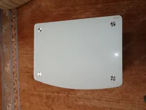 Glastisch mit Lenkrollen