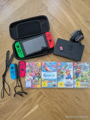 Nintendo Switch mit 4 videospiel + joycon und tasche
