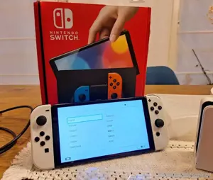 NINTENDO Switch Oled Konsole mit Garantie + Tasche + Spiel "Mario + Rabbits"