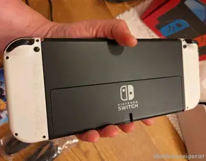NINTENDO Switch Oled Konsole mit Garantie + Tasche + Spiel "Mario + Rabbits" Bild 3