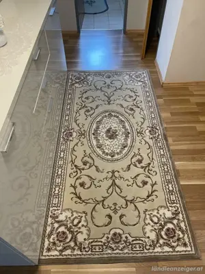 Teppich mit Blumenmuster 