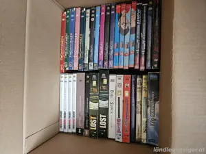 1 Schachtel voll mit Dvd's und Büchern abzugeben  Bild 2