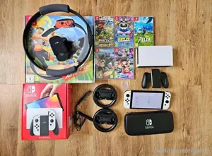 Nintendo Switch OLED mit 256GB Speicherkarte, Lenkrad, OVP
