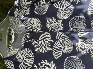 Durchgeknöpftes Kleid mit Puffärmeln Bild 7