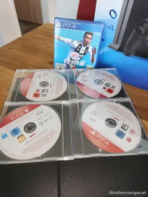 PS4 von Sony mit zwei Controllern und 5 Spielen  Bild 2