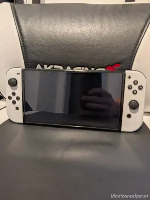 Nintendo Switch OLED Modell HEG-001 Handheld-Konsole   64 GB   Weiß