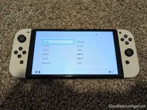 Nintendo Switch OLED Modell HEG-001 Handheld-Konsole   64 GB   Weiß Bild 3