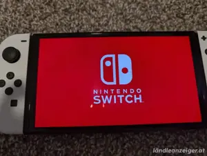 Nintendo Switch OLED Modell HEG-001 Handheld-Konsole   64 GB   Weiß Bild 2
