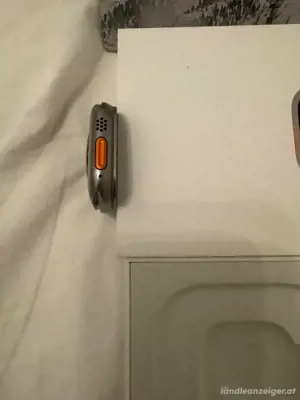 Apple Watch Ultra 49 mm Titangehäuse mit Starlight Alpine Loop, groß (GPS+.) Bild 3