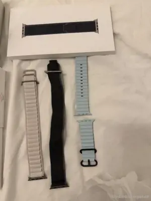 Apple Watch Ultra 49 mm Titangehäuse mit Starlight Alpine Loop, groß (GPS+.) Bild 4